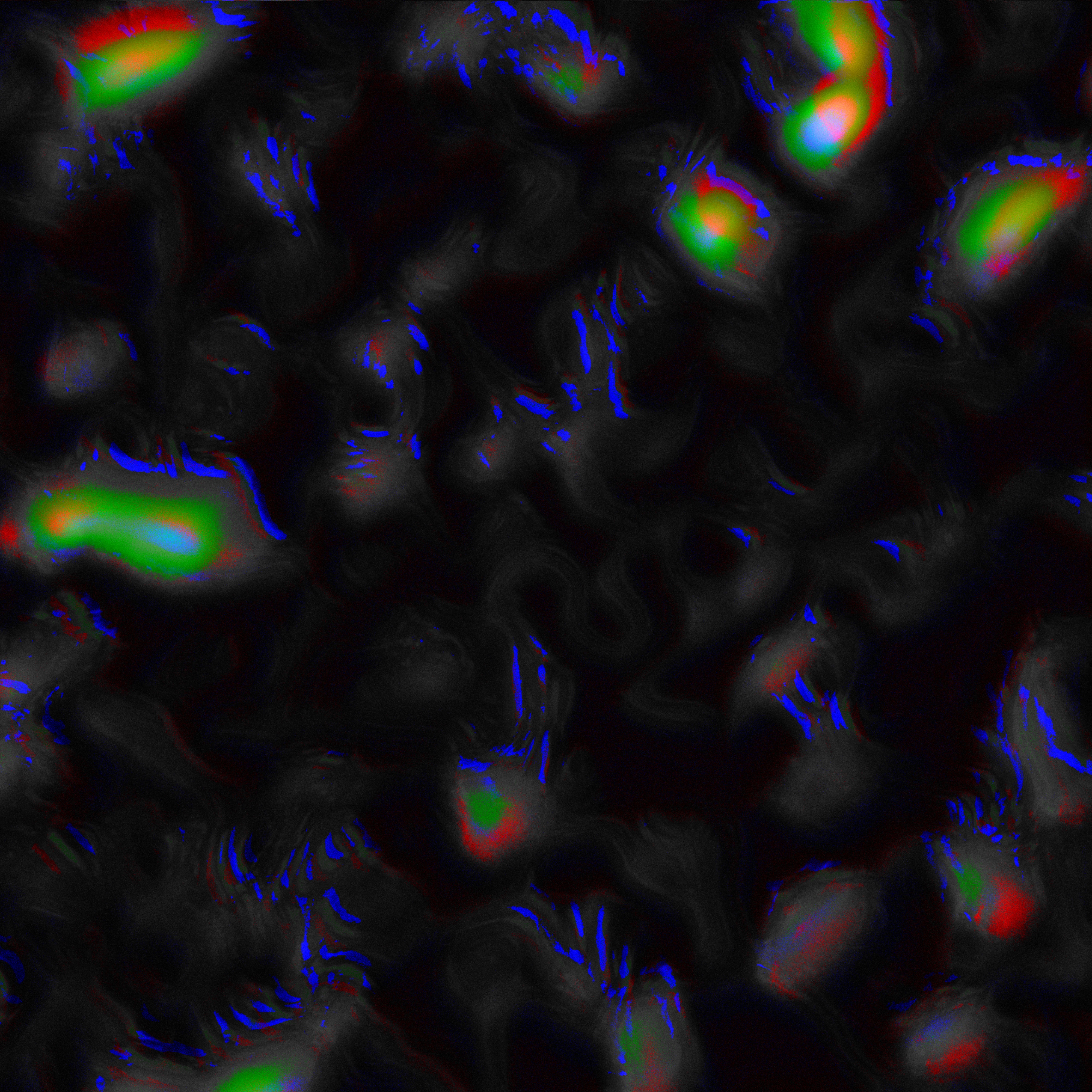 A dark field with saturated red-green-blue blooms interrupting the grey terrain. Color breaking through.